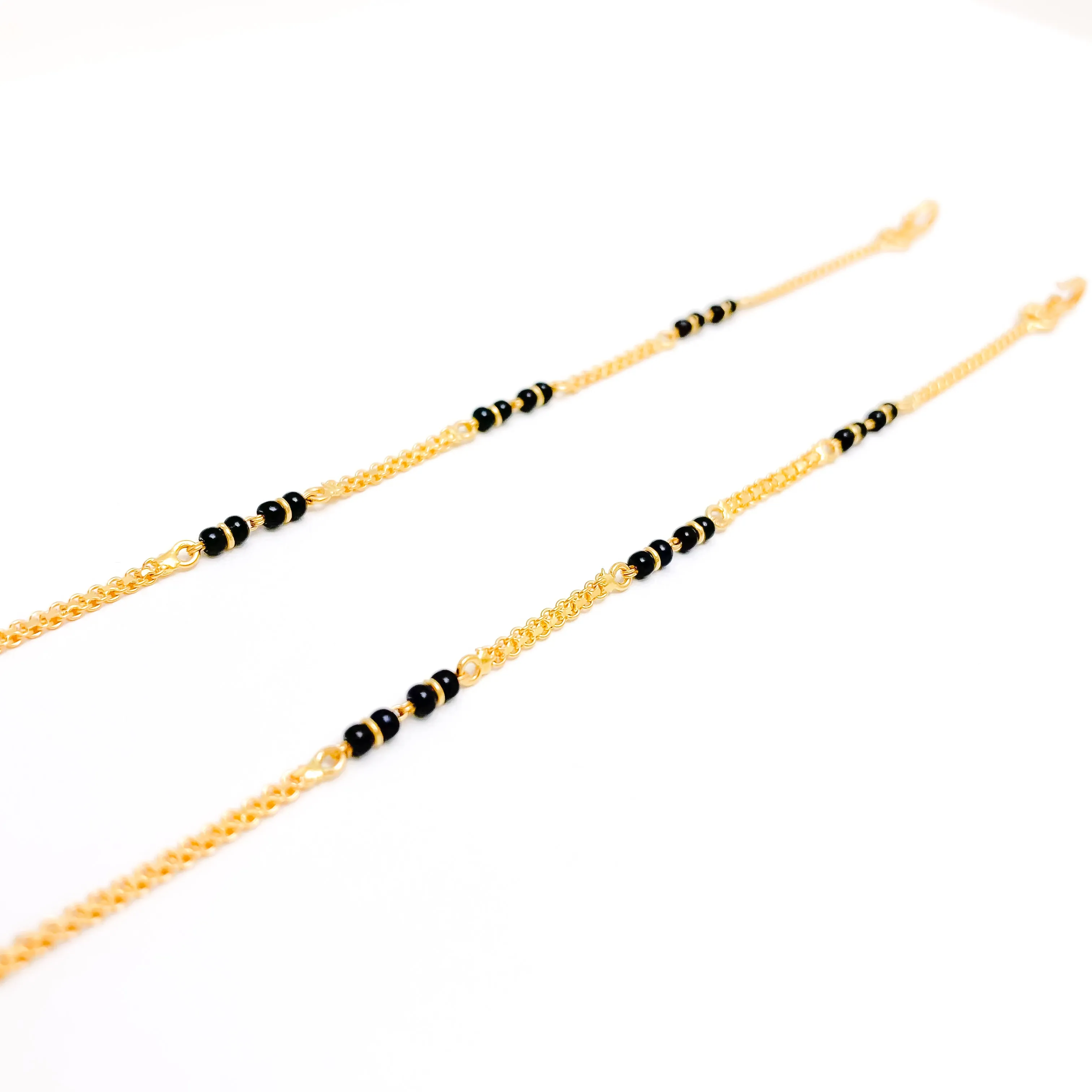 Black Bead Accented Baby Bracelet Pair