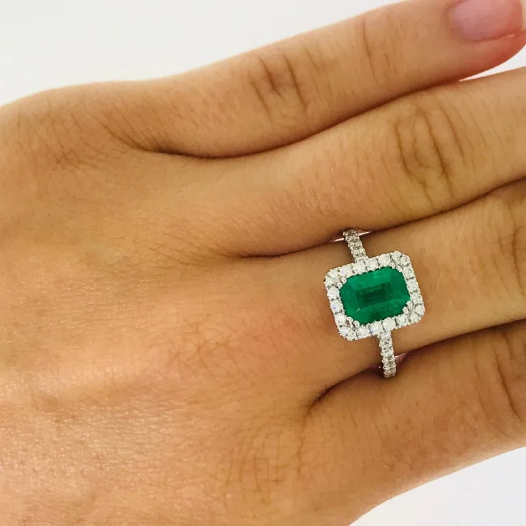 Emerald and Diamond Halo Engagement Ring