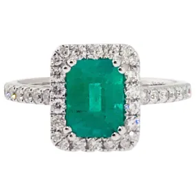 Emerald and Diamond Halo Engagement Ring